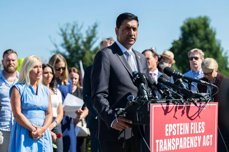 Rep. Ro Khanna speaks at a Capitol Hill press conference behind a podium sign reading Epstein Files Transparency Act