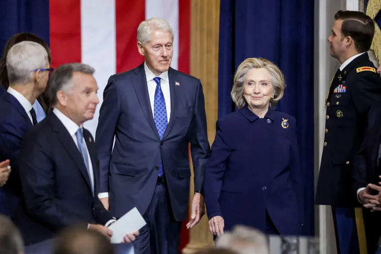 Bill and Hillary Clinton arrive at a formal event in Washington